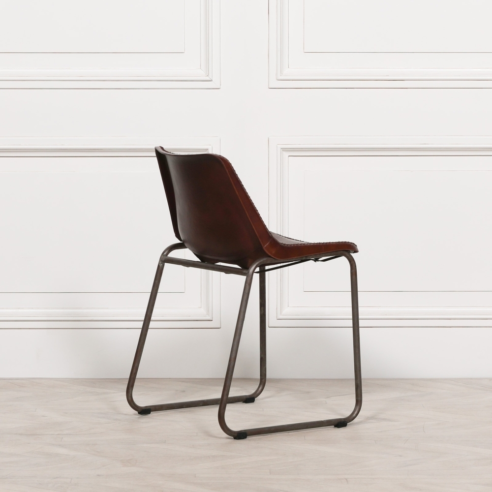 Product photograph of Industrial Saddle Style Leather Dinning Chair Sold In Pairs from Choice Furniture Superstore.